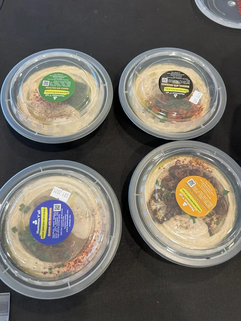 Sealed, labeled Hummus Y'all bowls ready for delivery